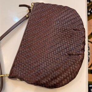 Retired color CLARE V Petit Moyen Crossbody Bag in burgundy.